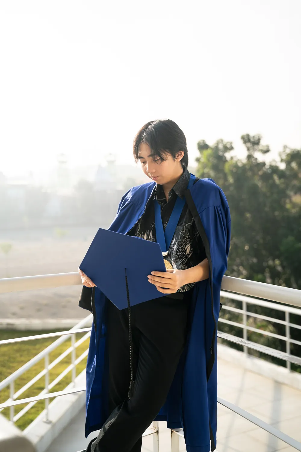 Toga graduation portrait, Petra Surabaya — Kevin Oey Dinata by Stefanoes Visual